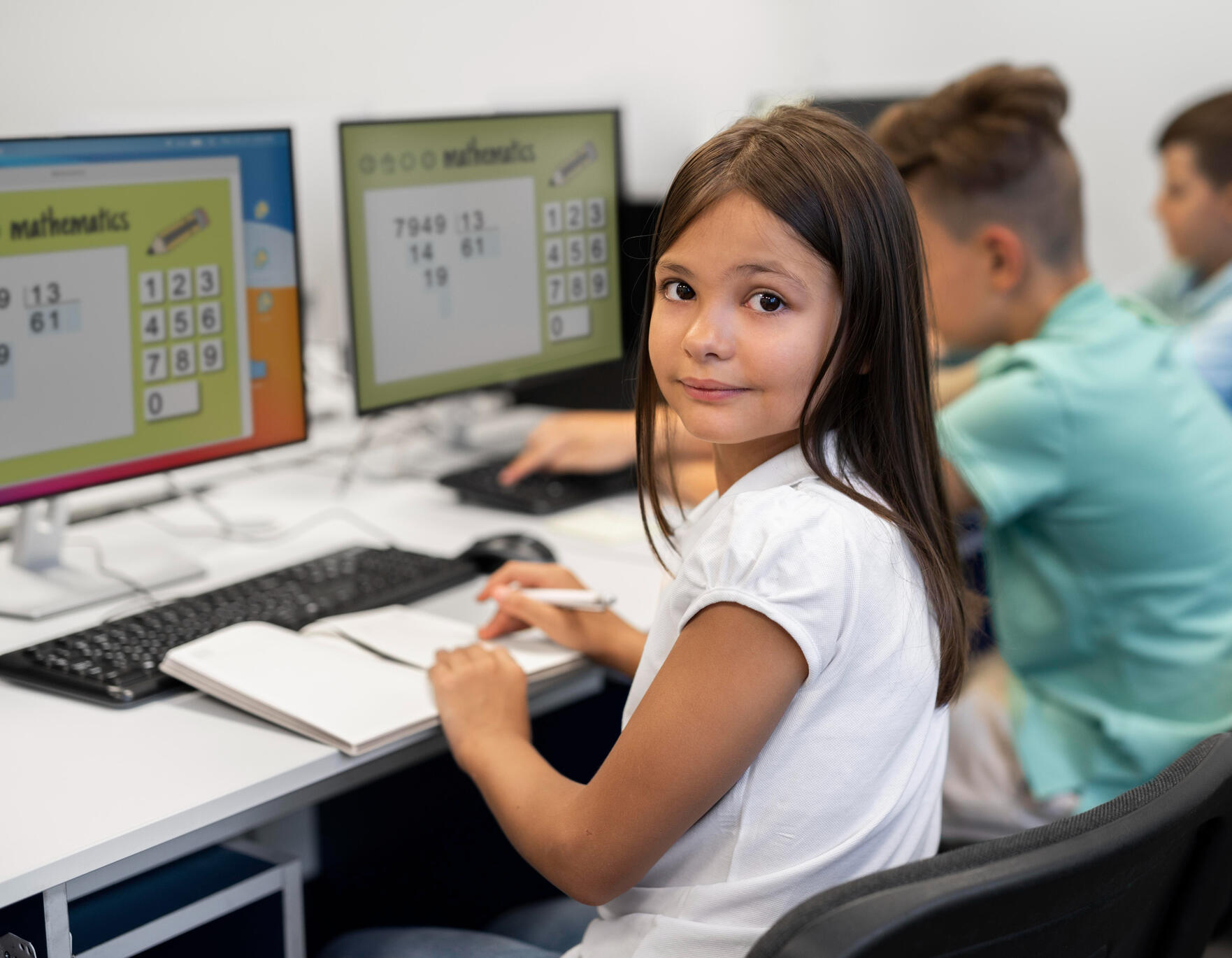 small girl using a computer